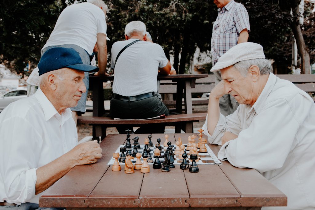 Elderly playing chest