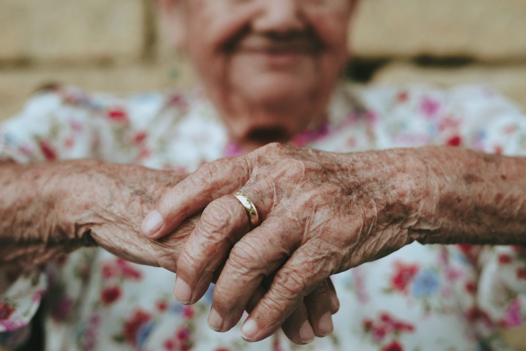 old women hands wearing ring